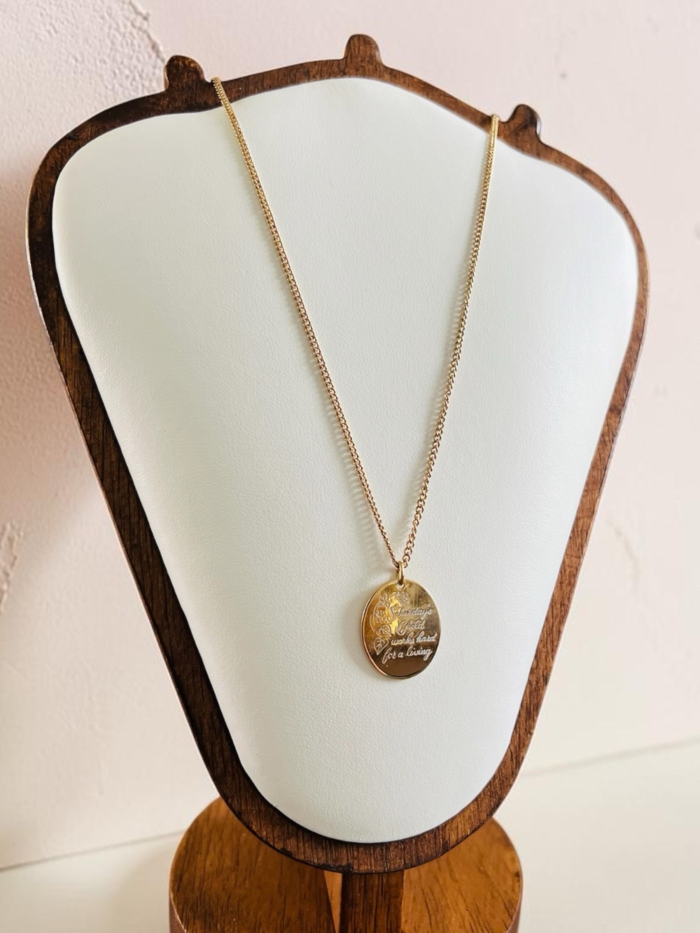 Avon Gold Toned Engraved Oval “Saturday’s Child” Pendant Necklace